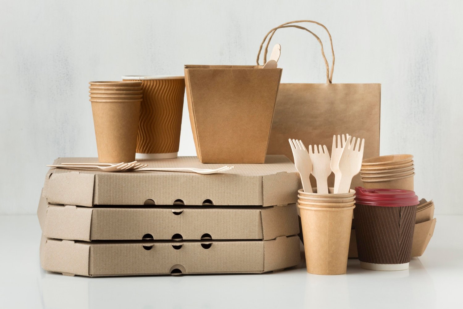 Consumer packaging: cups, bags, pizza boxes, and cutlery